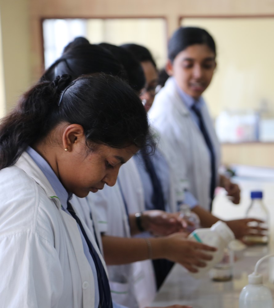 Students working in a pharmaceutical laboratory